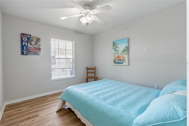 bedroom featuring ceiling fan and light wood-type flooring