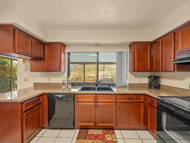 kitchen with sink, light stone counters, a textured ceiling, light tile patterned floors, and black appliances