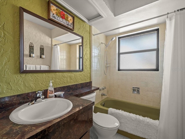 full bathroom with vanity, shower / bath combination with curtain, and toilet