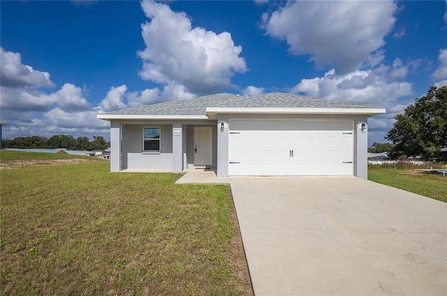 single story home with a garage and a front yard