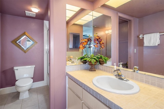 4620 Bay Blvd Unit 1148, Port Richey, FL 34668 - bathroom featuring vanity, toilet, tile patterned floors, and baseboards