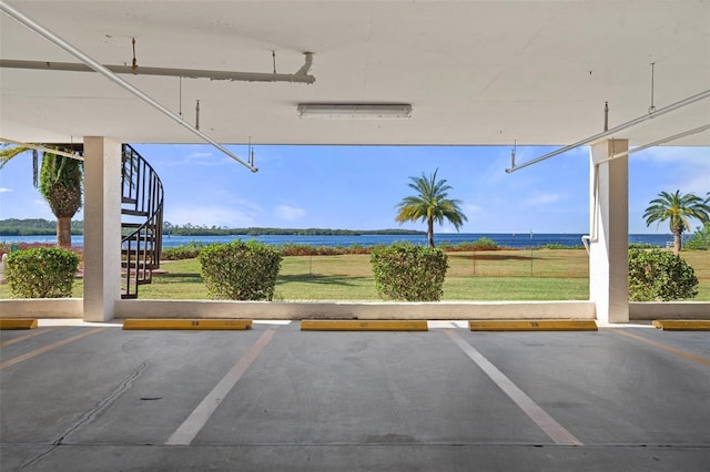 interior space featuring a yard and a water view