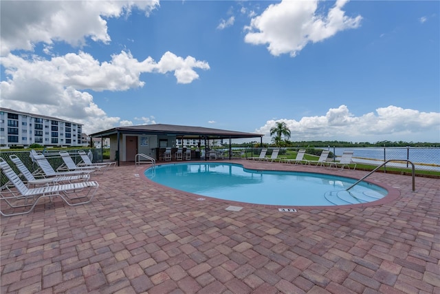 4620 Bay Blvd Unit 1148, Port Richey, FL 34668 - community pool featuring a patio area