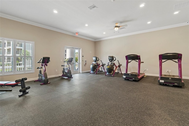 gym with ceiling fan, plenty of natural light, and ornamental molding