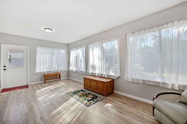 sunroom / solarium with a wealth of natural light