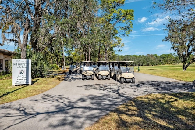 surrounding community featuring a lawn