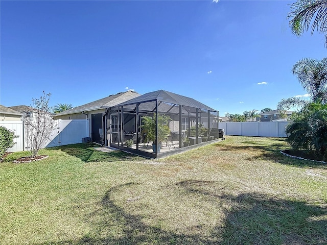 view of yard featuring a lanai