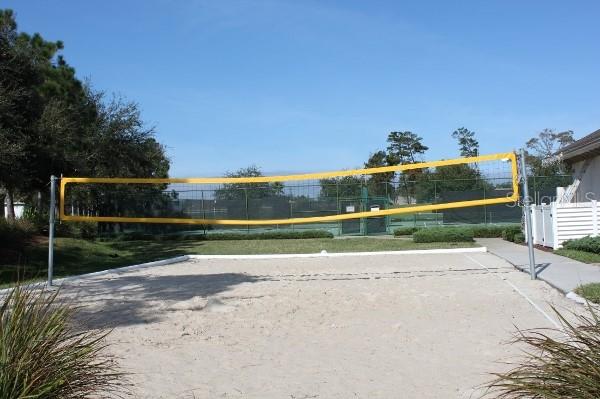 surrounding community featuring volleyball court