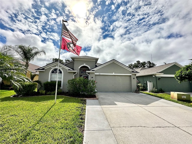 view of front facade featuring a front yard and a garage