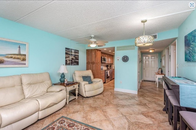 living room featuring ceiling fan