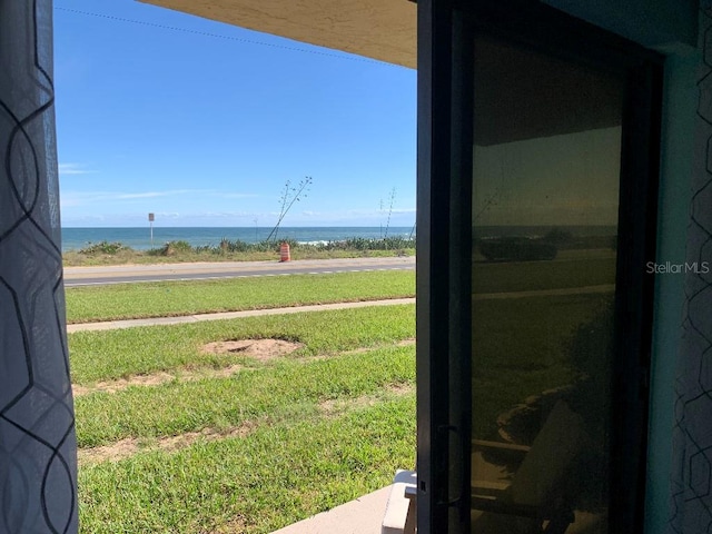 view of yard with a water view