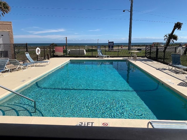 view of swimming pool featuring a patio