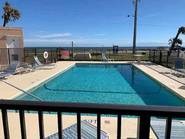 view of pool featuring a patio