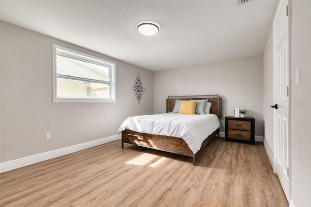 bedroom featuring light wood-type flooring