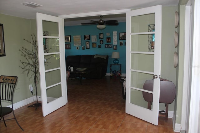 corridor with tile patterned flooring, french doors, visible vents, and baseboards