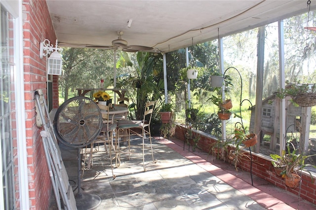 view of patio with ceiling fan and outdoor dining space