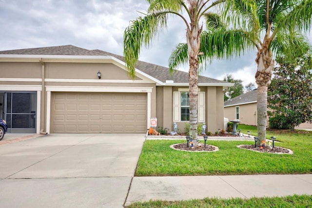 ranch-style home featuring a front yard and a garage