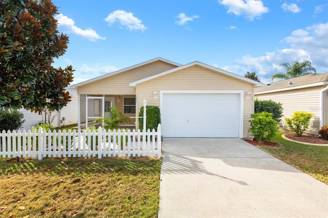 single story home with a garage and a front yard