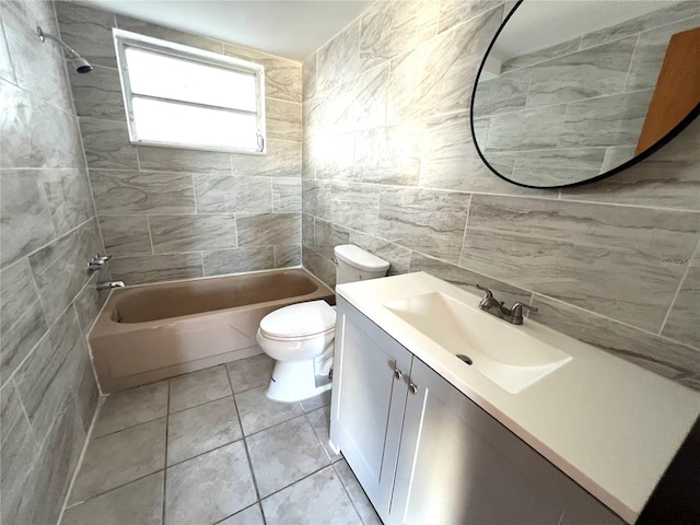 full bathroom featuring tasteful backsplash, vanity, tile walls, toilet, and tiled shower / bath