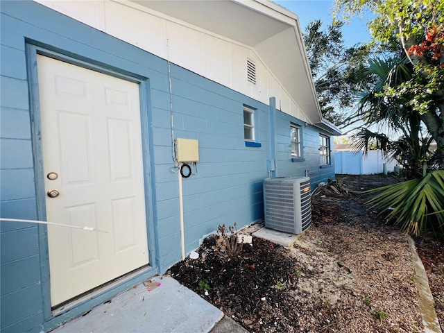 entrance to property with central AC unit