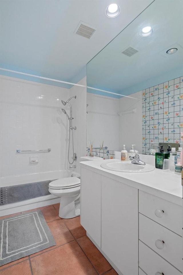 full bathroom featuring shower / washtub combination, toilet, tile patterned floors, and vanity