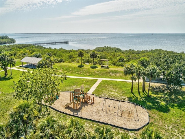 view of property's community featuring a playground and a water view