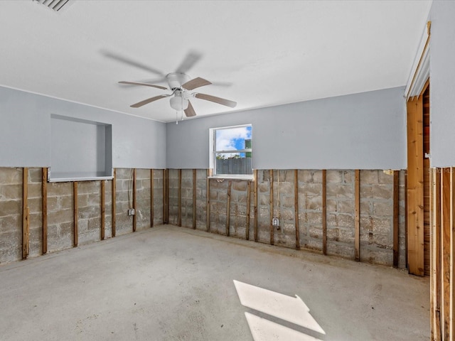 basement featuring ceiling fan