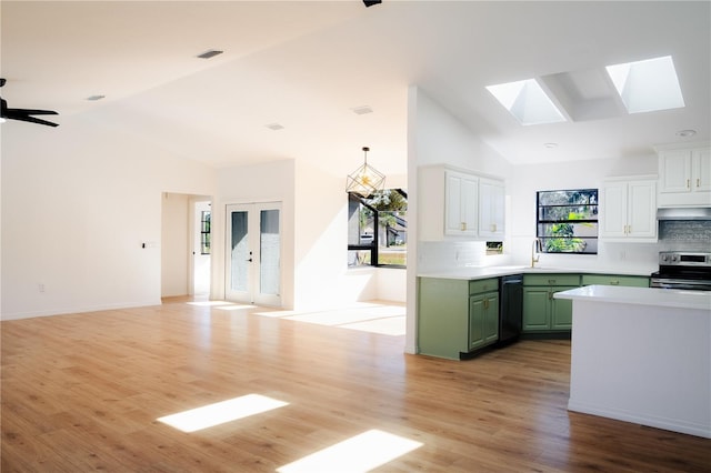 kitchen with electric range, light hardwood / wood-style flooring, high vaulted ceiling, and green cabinetry