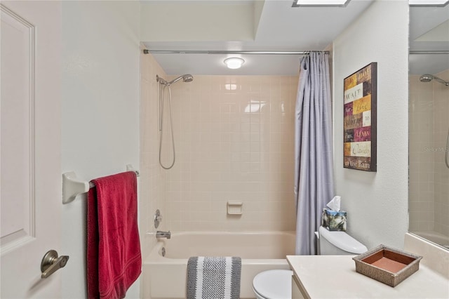 full bathroom with vanity, toilet, and shower / tub combo with curtain