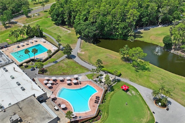 drone / aerial view with a water view