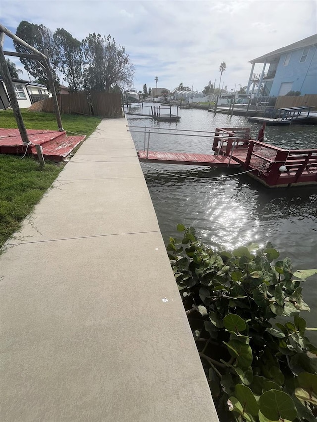 dock area with a water view