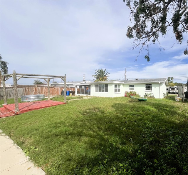 view of yard with a wooden deck