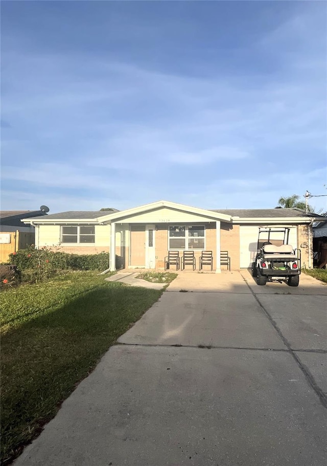 13639 Frances Ave, Hudson, FL 34667 - view of front of house featuring concrete driveway