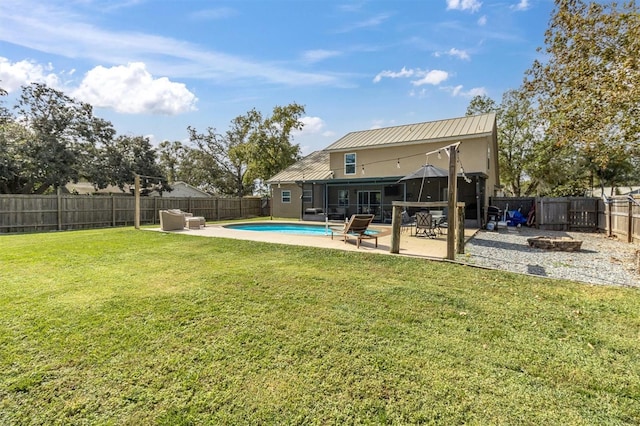 exterior space featuring a patio area and a fenced in pool