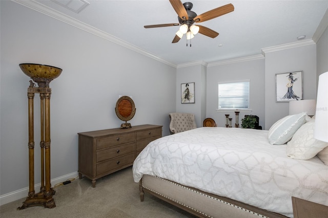 bedroom with ceiling fan, light colored carpet, and crown molding