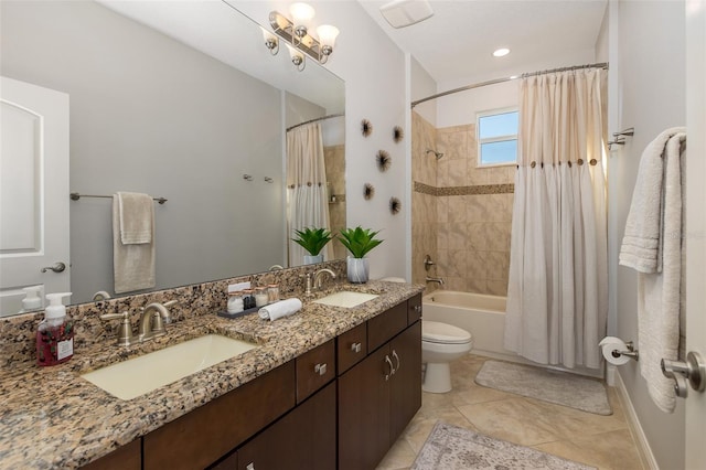 full bathroom featuring tile patterned flooring, shower / tub combo, vanity, and toilet