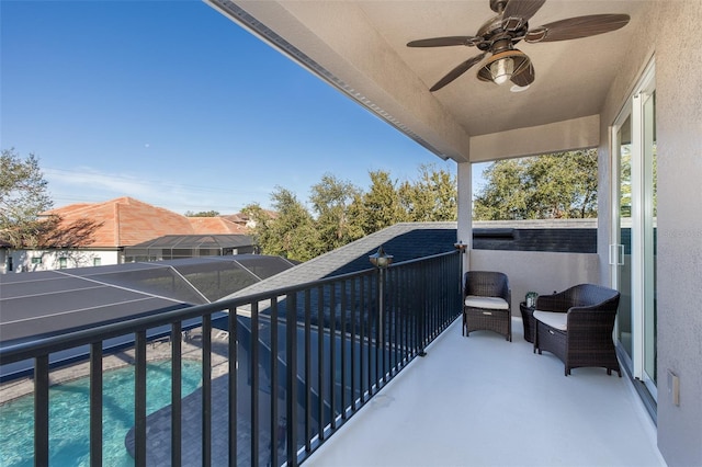 balcony featuring ceiling fan