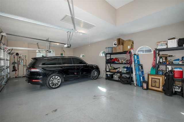 garage featuring a garage door opener