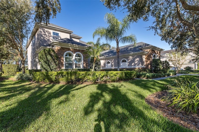 view of front of home with a front yard