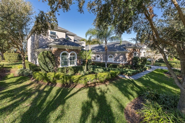 exterior space featuring a front yard