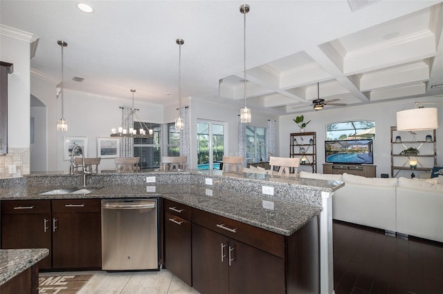 kitchen with beam ceiling, coffered ceiling, light stone counters, stainless steel dishwasher, and ceiling fan with notable chandelier