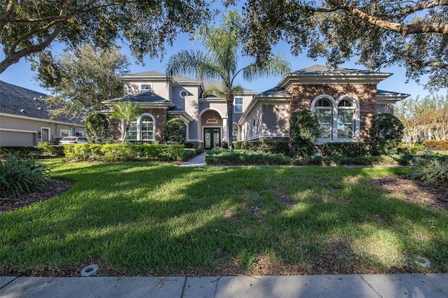 view of front of home with a front lawn