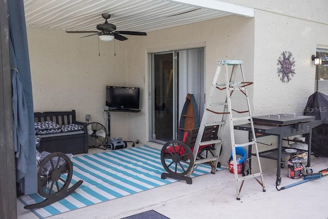 view of patio with ceiling fan