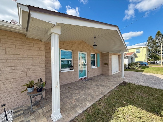 view of patio with a garage