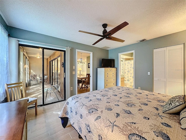 bedroom with access to exterior, ceiling fan, a textured ceiling, a closet, and light wood-type flooring