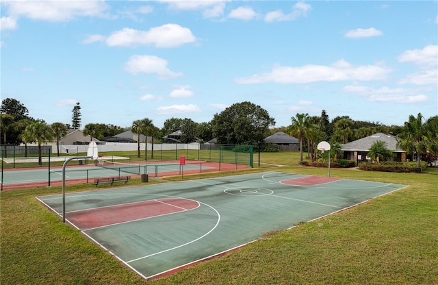 view of basketball court featuring a lawn and tennis court