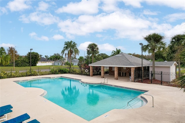 view of pool featuring a patio