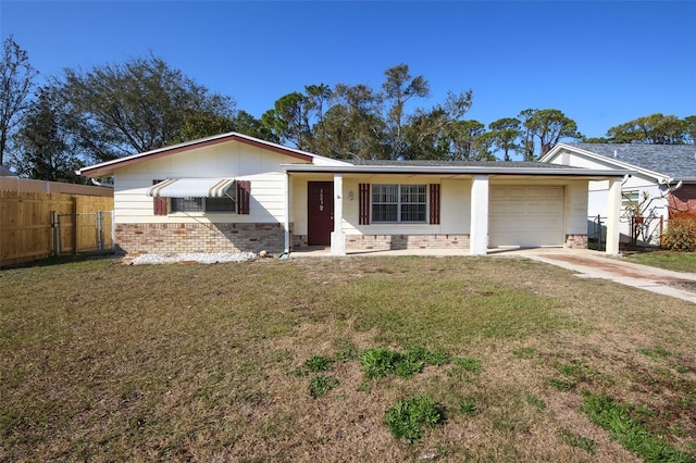 single story home with a front yard and a garage