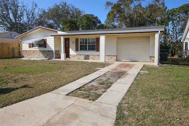 view of front of house with a garage and a front yard