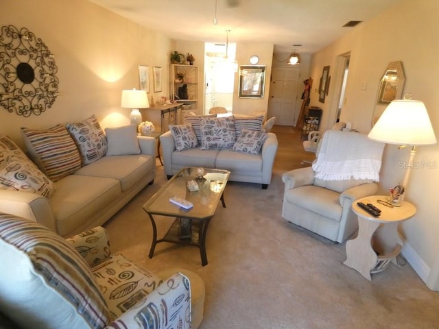 living room with light colored carpet